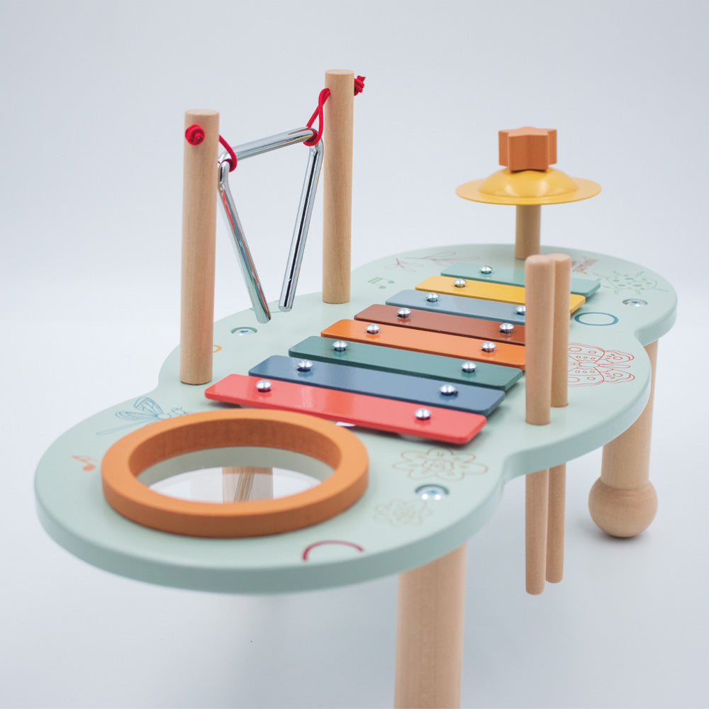 Side view of wooden music activity table for toddlers 12 months plus